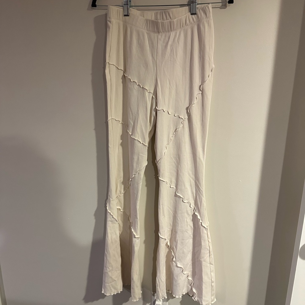 Cream Ruffle Seam Flared Ribbed Pants